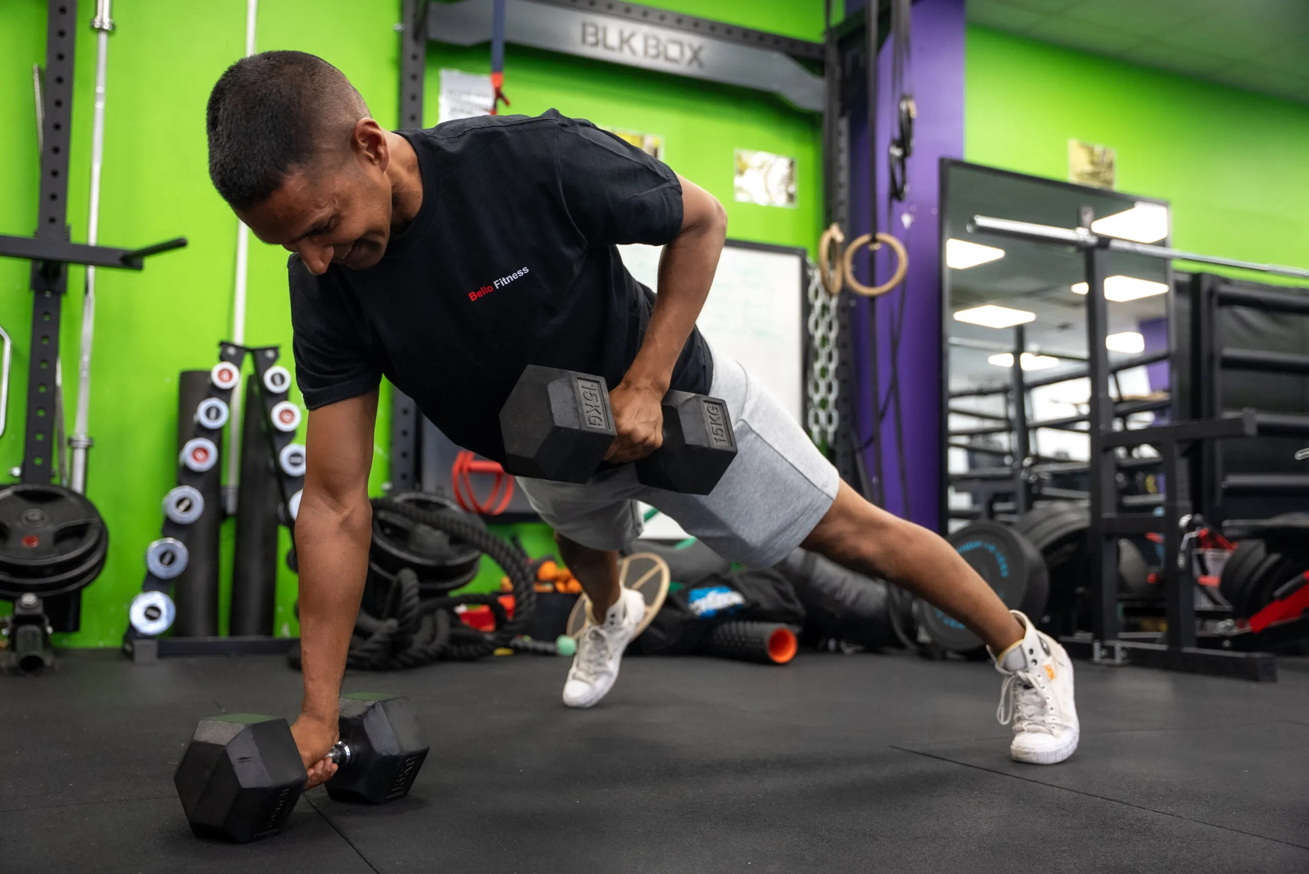 A learner performing a dumbbell exercise at Fit For Life Youth Gym