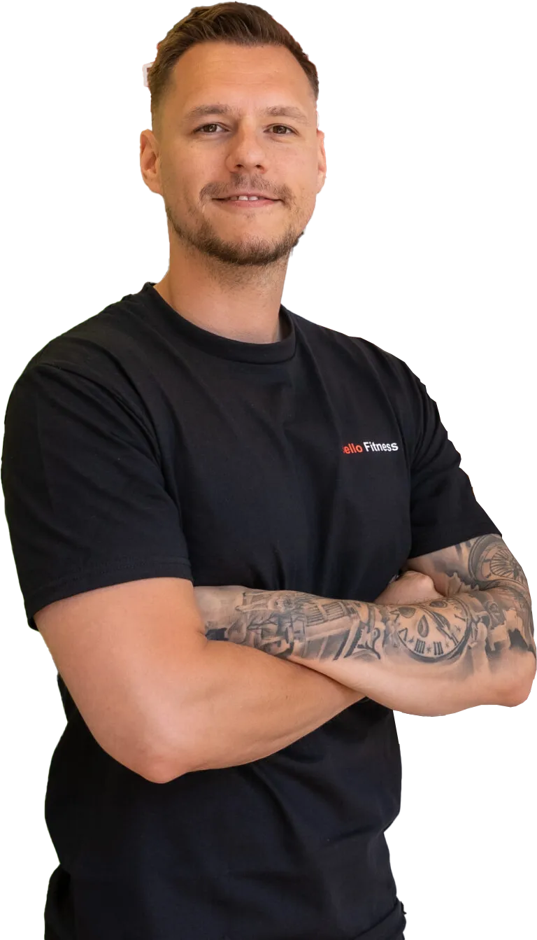 Seve Bello, founder of Bello Fitness, arms crossed